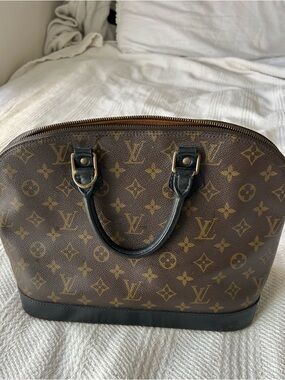 Louis Vuitton Monogram Alma in Brown and Black with Gold Hardware